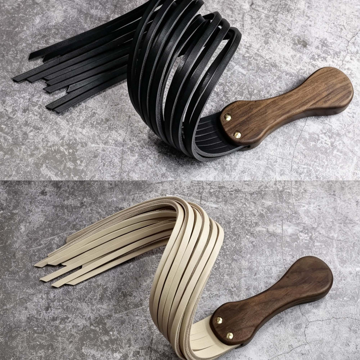 Black and natural tan leather floggers coiled on stone surface – walnut wood handle gold rivet dual color comparison BDSM
