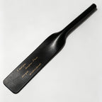 Black leather riding crop with custom gold engraving example – personalized text vegetable tanned handmade BDSM
