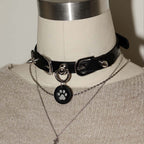 Black leather spiked choker on mannequin – silver hardware cone rivets custom tag pendant BDSM collar petplay
